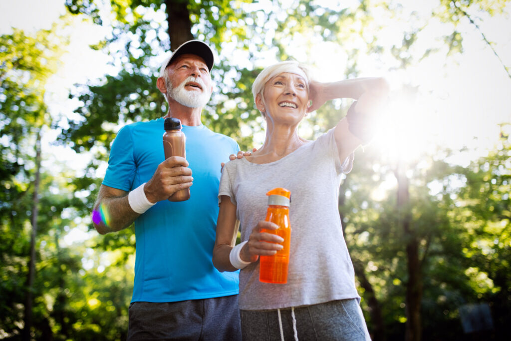 Two active senior friends exercising independent retirement community